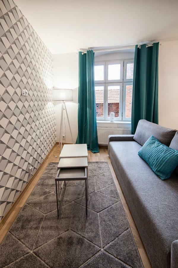 Apartamenty Torunskie Pod Krzywa Wieza Esterno foto