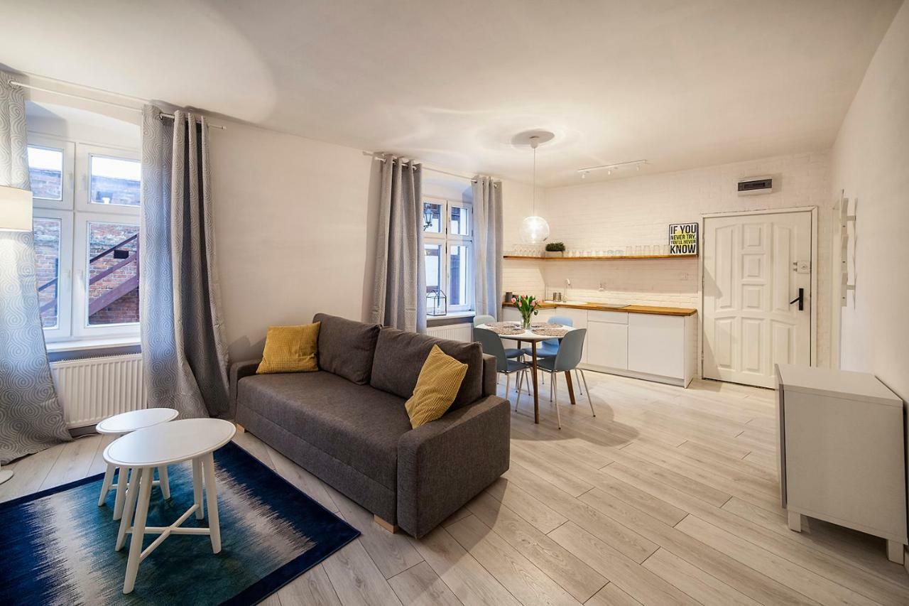 Apartamenty Torunskie Pod Krzywa Wieza Esterno foto