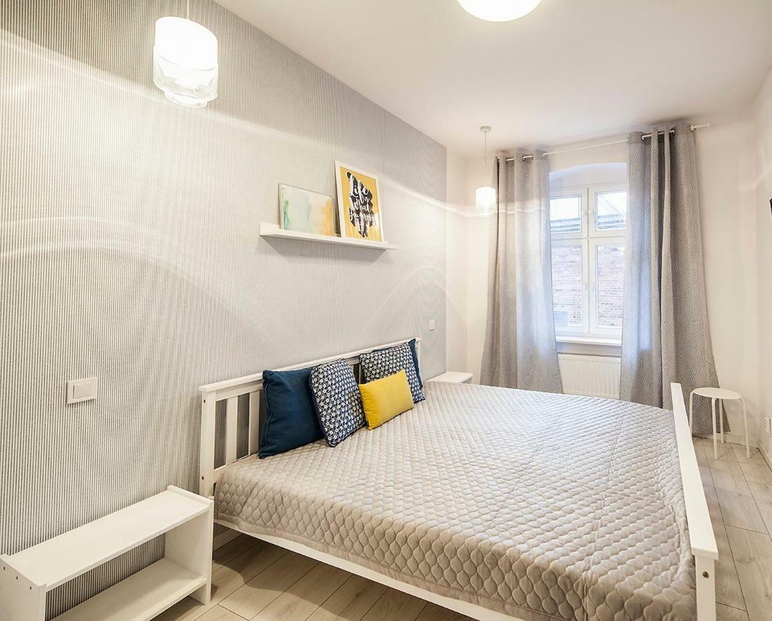 Apartamenty Torunskie Pod Krzywa Wieza Esterno foto