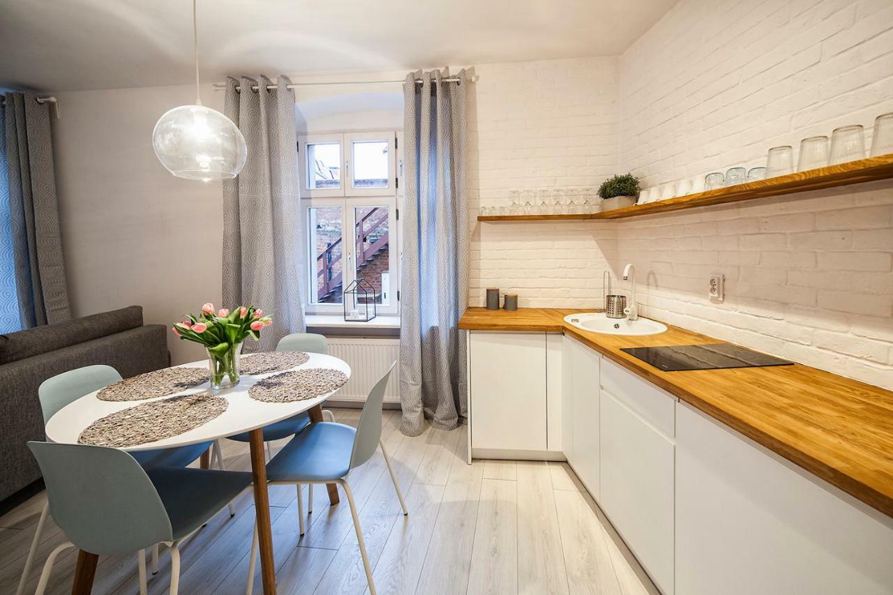 Apartamenty Torunskie Pod Krzywa Wieza Esterno foto