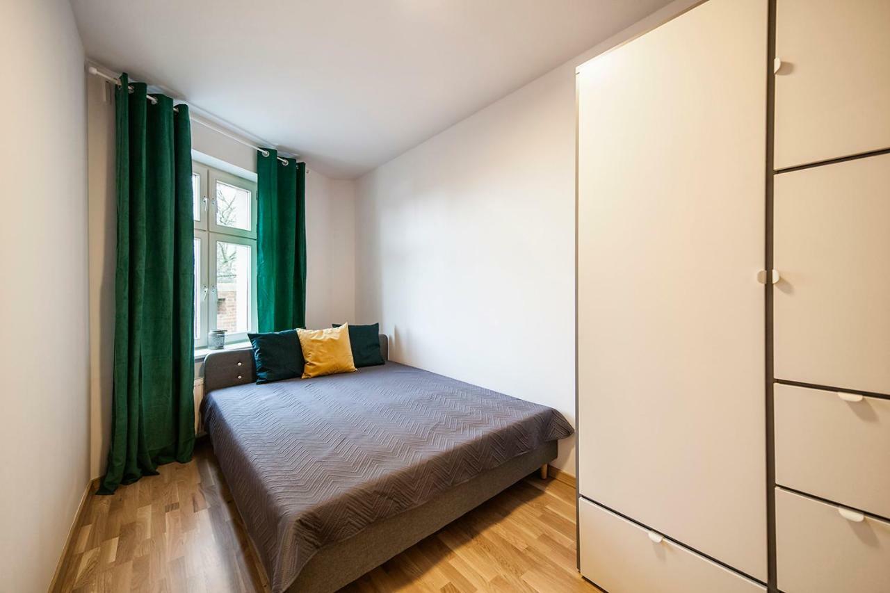 Apartamenty Torunskie Pod Krzywa Wieza Esterno foto