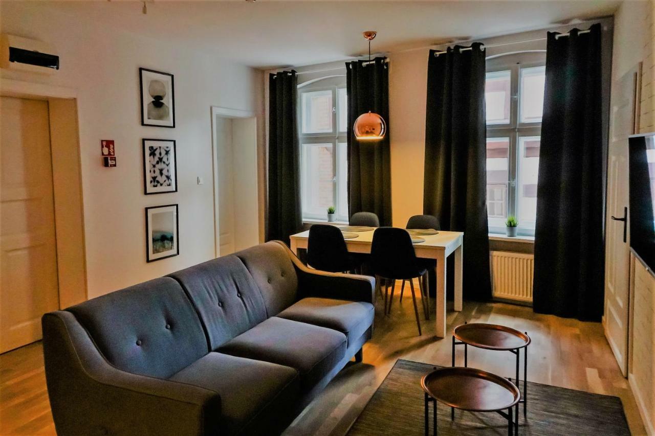 Apartamenty Torunskie Pod Krzywa Wieza Esterno foto