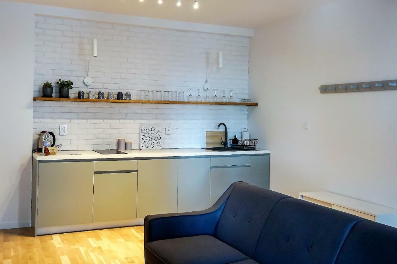 Apartamenty Torunskie Pod Krzywa Wieza Esterno foto