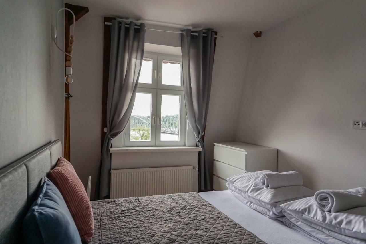 Apartamenty Torunskie Pod Krzywa Wieza Esterno foto