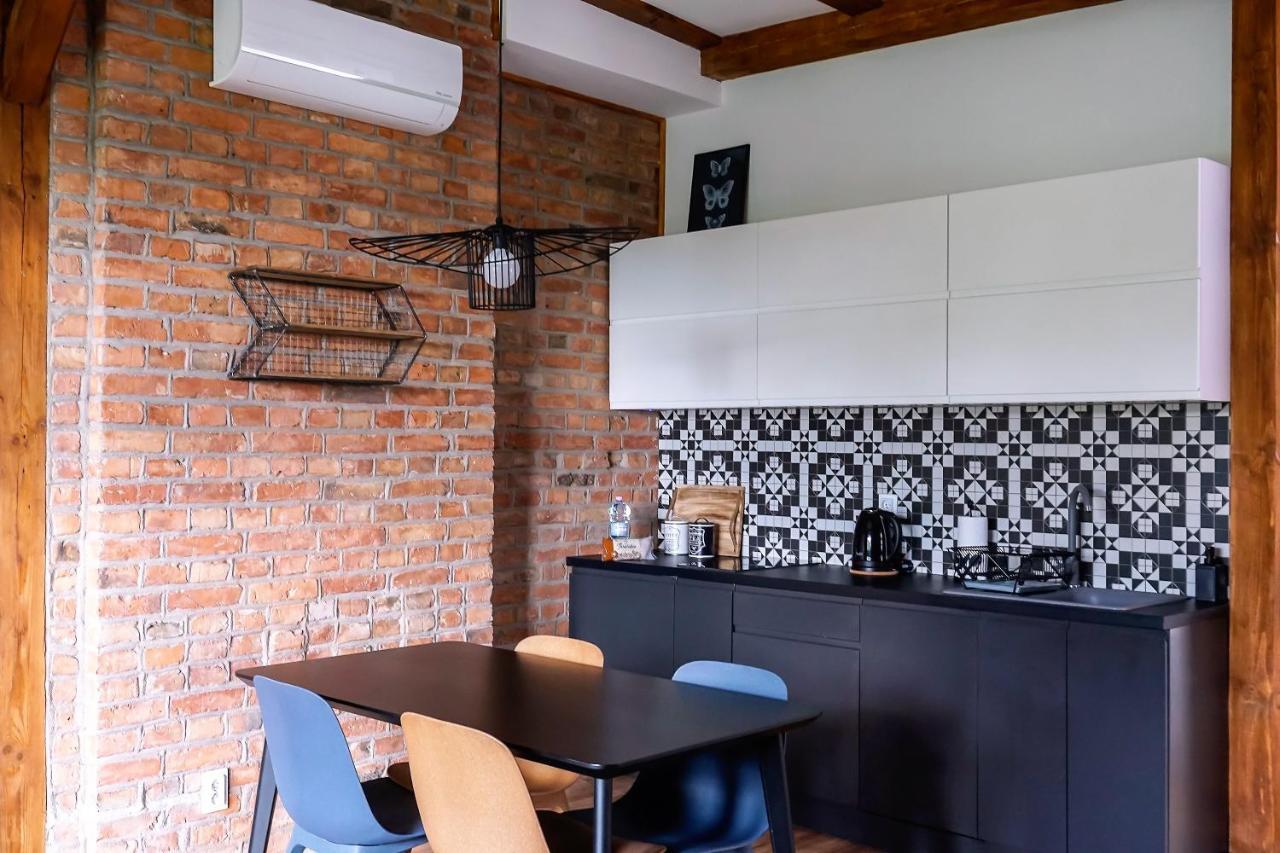 Apartamenty Torunskie Pod Krzywa Wieza Esterno foto