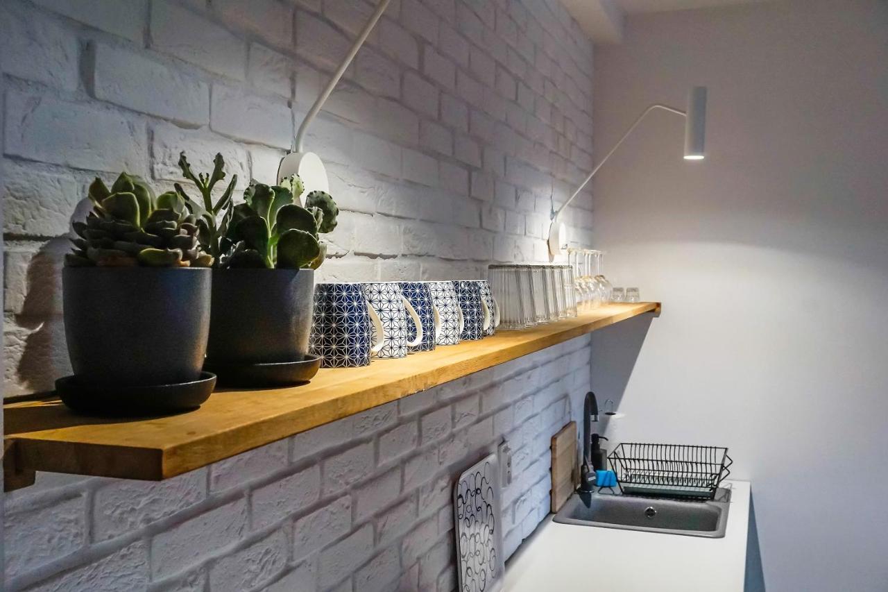 Apartamenty Torunskie Pod Krzywa Wieza Esterno foto